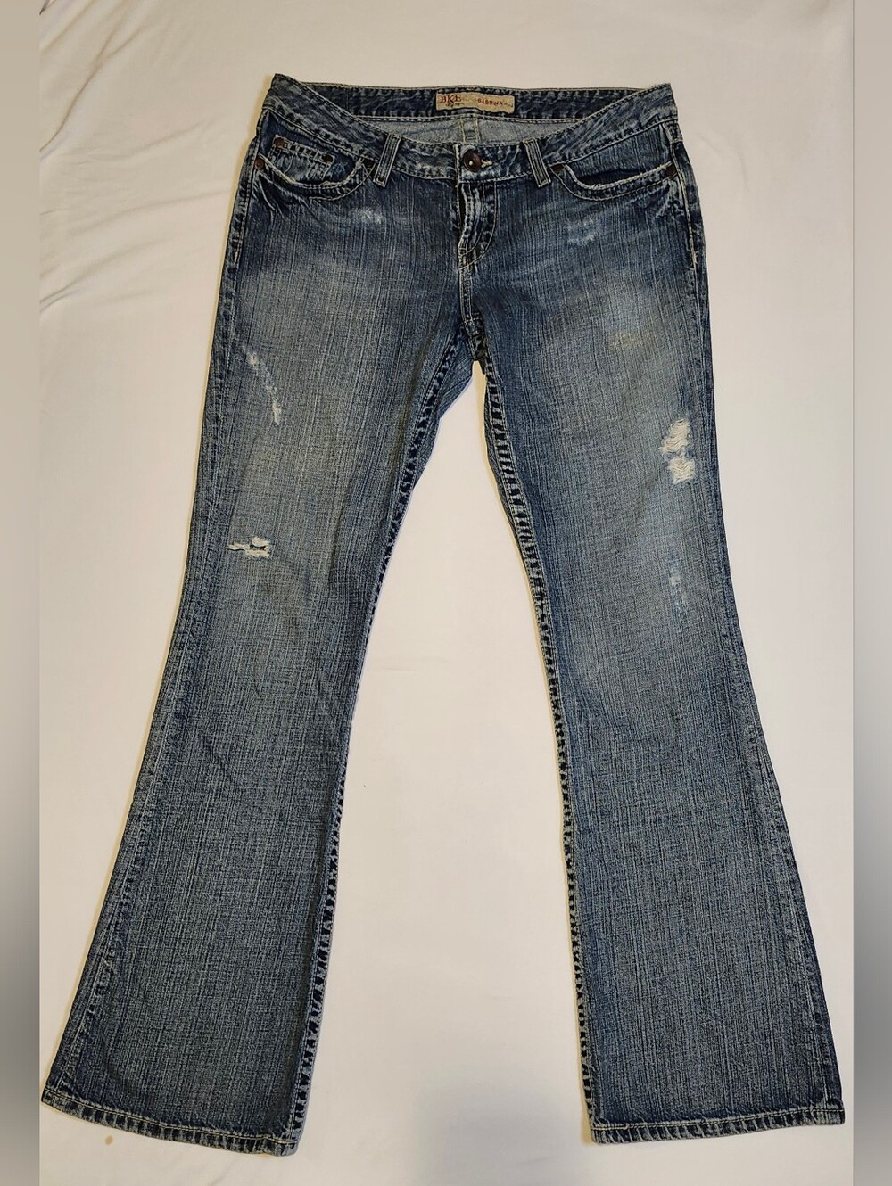 BKE Women's Sabrina Blue Bootcut Jeans with Light Distressing. 30x33.5